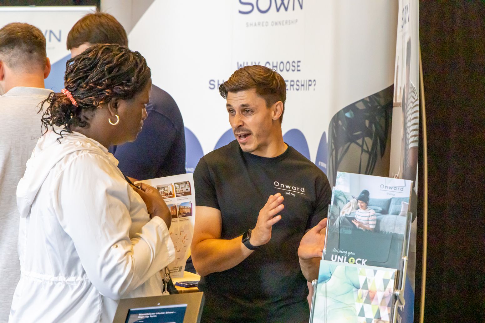 Attendee getting expert advice at the Manchester Home Show