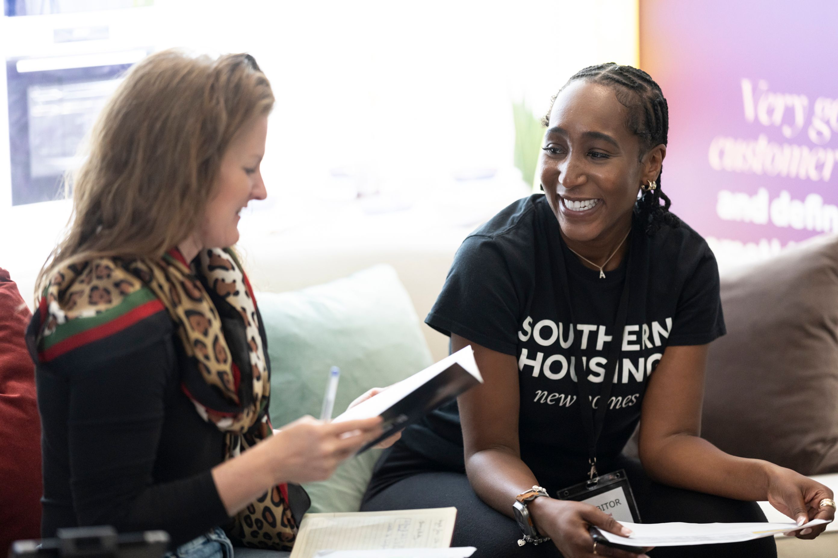 Attendee getting property advice at a Share to Buy Live event.