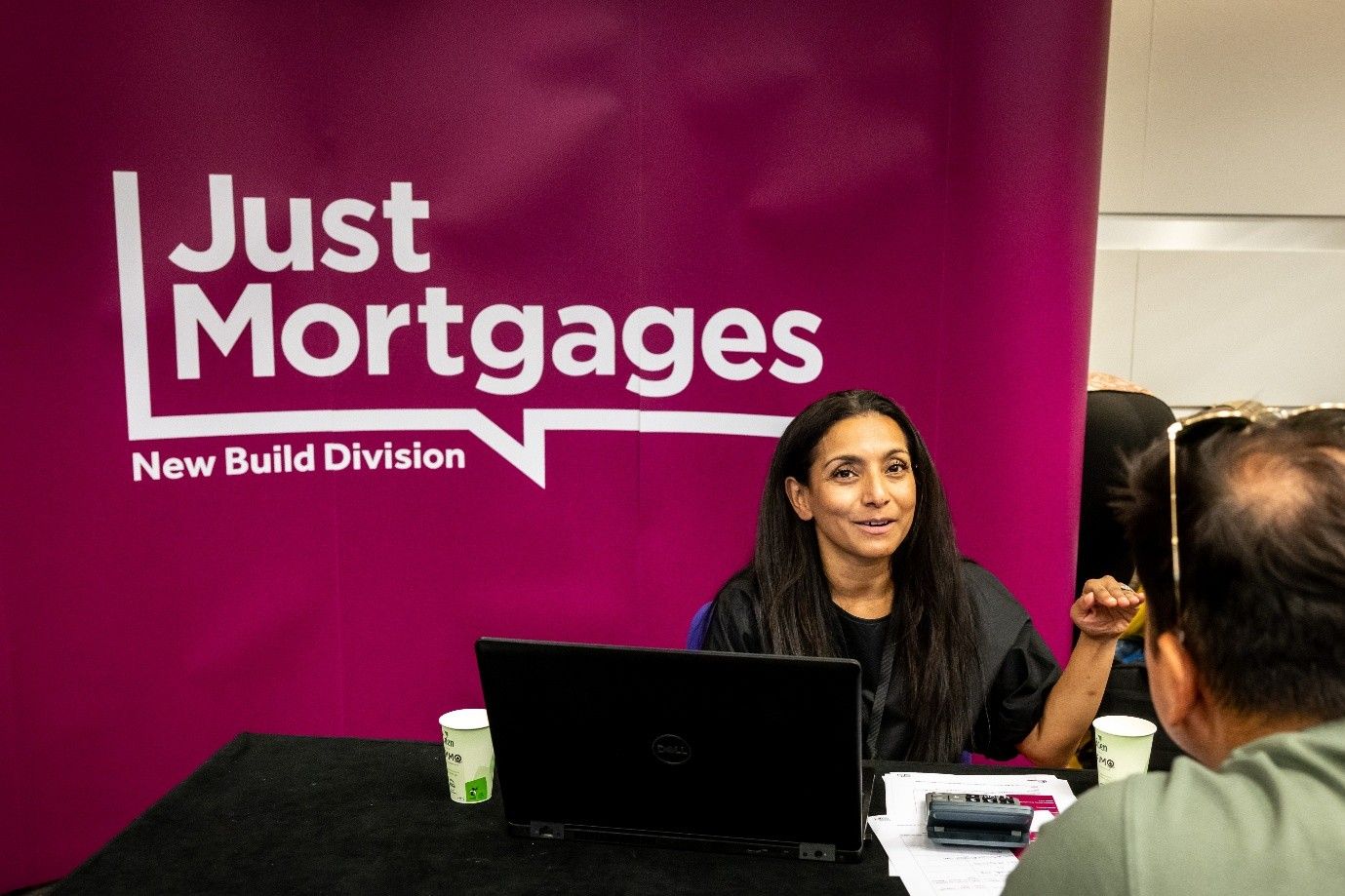 Share to Buy Live event attendee getting advice from housing expert.